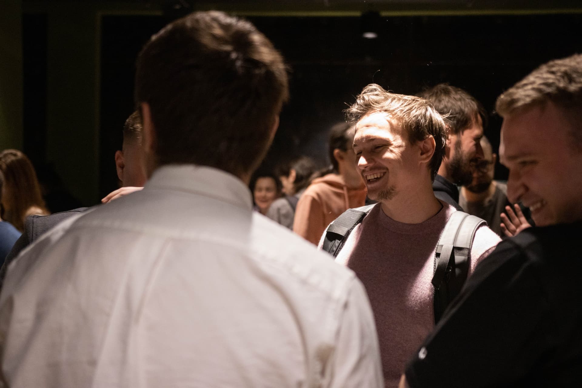 Speakers on stage discussing JavaScript topics